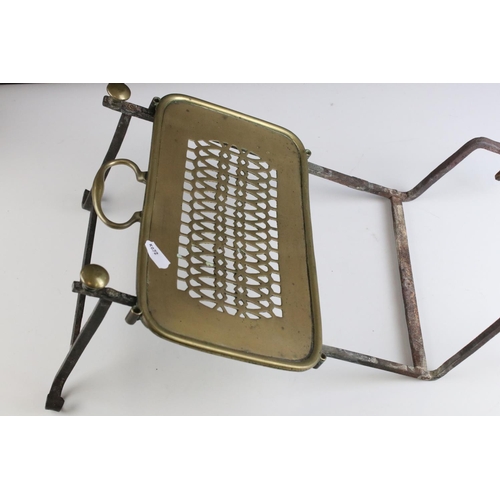 145 - Antique Brass and Iron Grate Hanging Trivet, with brass pierced sliding plate, 26cms wide