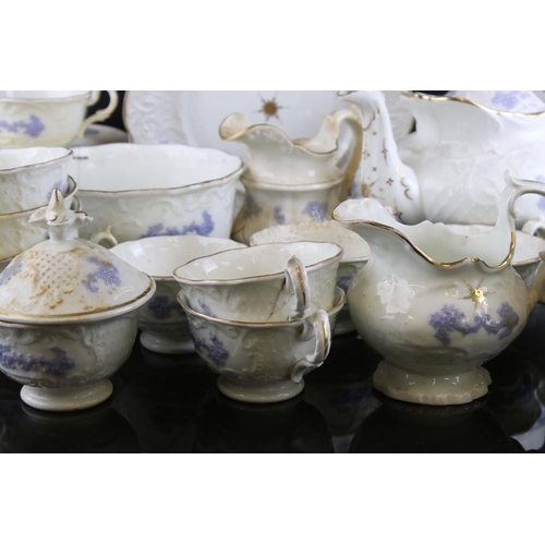 149 - 19th century matched Ceramic Tea Set, white body and raised lilac decoration, including teapot, milk... 