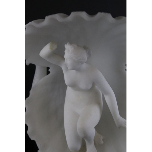 150 - Carved Alabaster Grand Tour style Sculpture of Venus kneeling within an open clam shell held by dolp... 