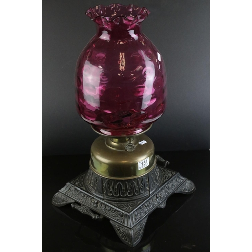 151 - Large Victorian Brass Oil Lamp with Dimpled Cranberry Glass Shade and held on a Large Square Cast Ir... 