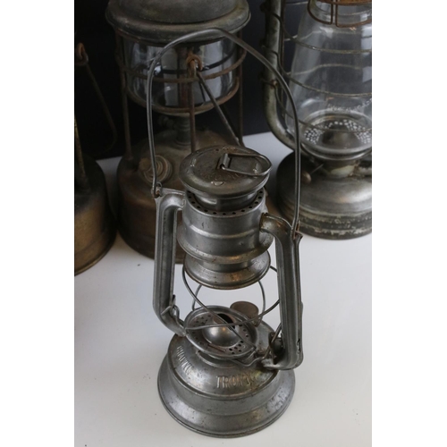 162 - Group of eight vintage oil storm lanterns