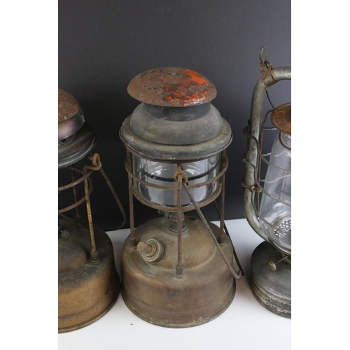 162 - Group of eight vintage oil storm lanterns