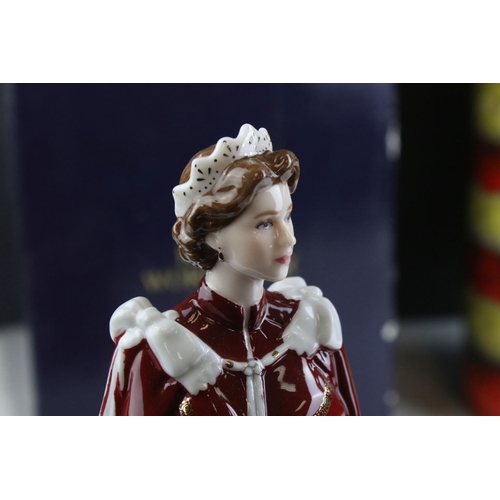 403 - A Royal Worcester figure in celebration of the Queens 80th Birthday together with a West German pott... 