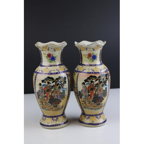 404 - Pair of oriental hand painted & gilt vases 'Geishas In The Garden'