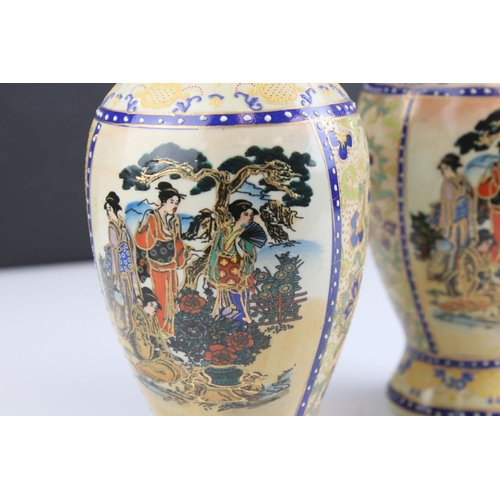 404 - Pair of oriental hand painted & gilt vases 'Geishas In The Garden'