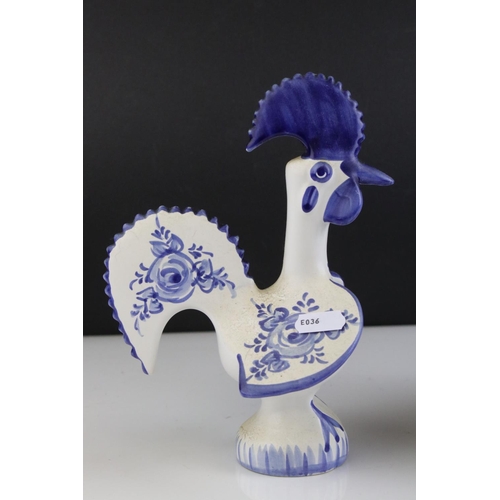 415 - A set of three Portuguese ceramic blue and white chickens.