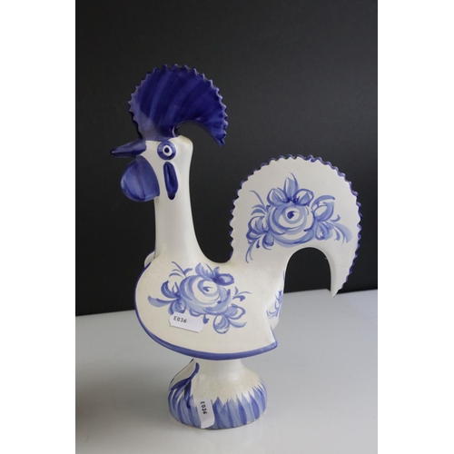 415 - A set of three Portuguese ceramic blue and white chickens.