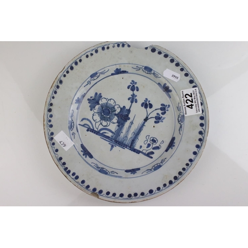 422 - Two English Delft blue and white plates and a Delft vase. Part of an extensive collection of items f... 