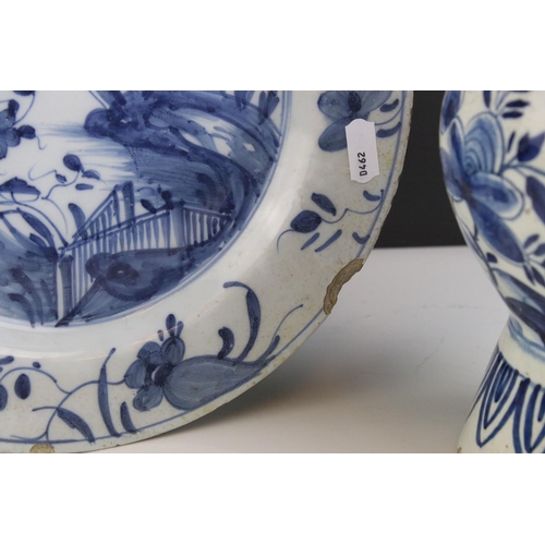 422 - Two English Delft blue and white plates and a Delft vase. Part of an extensive collection of items f... 