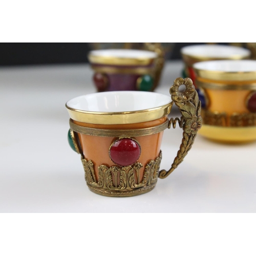 443 - Gilt metal and porcelain coffee set, probably made for the Turkish or Persian market, approx 18cm hi... 