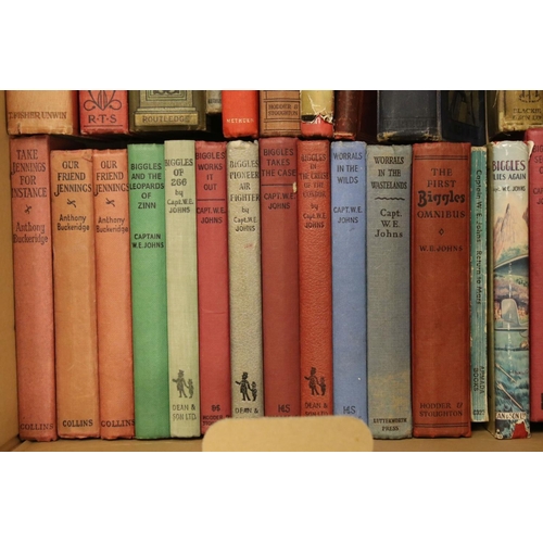 447 - A collection of vintage children's books to include Biggles and Peter Pan.