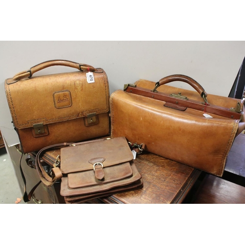 470 - A group of three leather bags to include a Gladstone bag by Atelier Pedro.