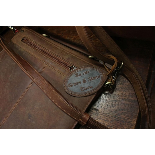 470 - A group of three leather bags to include a Gladstone bag by Atelier Pedro.