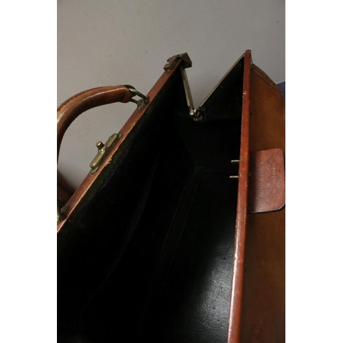 470 - A group of three leather bags to include a Gladstone bag by Atelier Pedro.