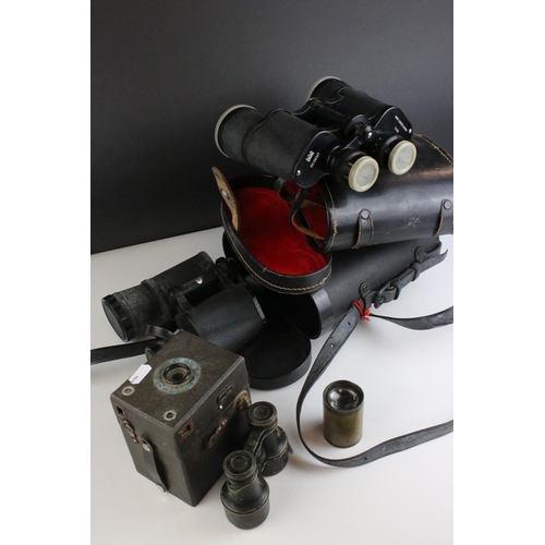 482 - Two pairs of cased binoculars together with a pair of opera glasses and a Warwick box camera.