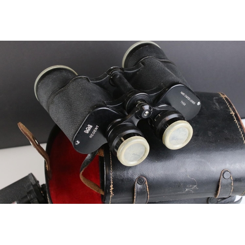 482 - Two pairs of cased binoculars together with a pair of opera glasses and a Warwick box camera.