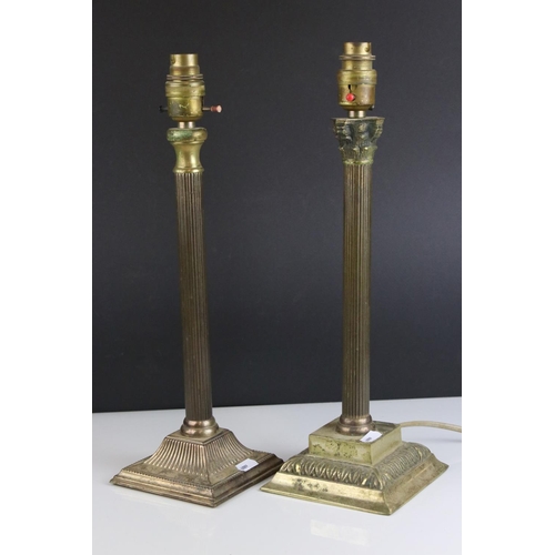 484 - Two Corinthian style table lamps.