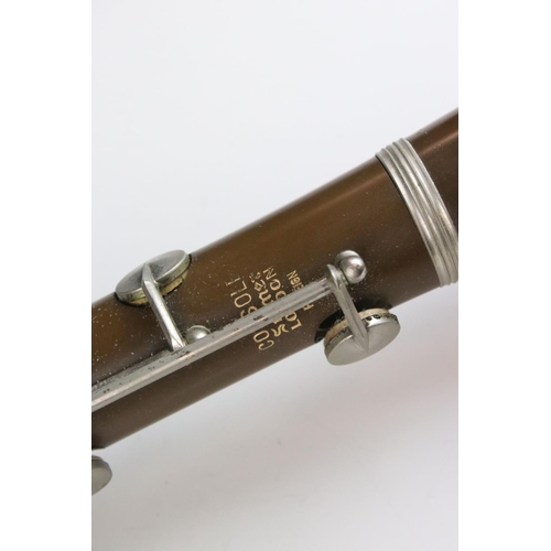 486 - A Console Selmer Clarinet.