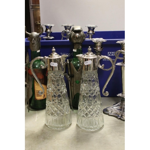 487 - Box of silver plated items to include candelabra, cut glass claret jug, together with two novelty st... 