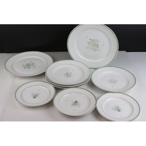 488 - A Royal Copenhagen Gron Melodi set of plates of various sizes together with bowls.