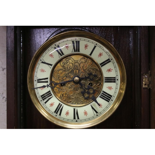 521 - A antique Vienna style drop dial twin train movement wall clock with brass weights.