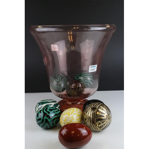 574 - A large rose art glass vase together with a selection of ceramic decorative eggs.