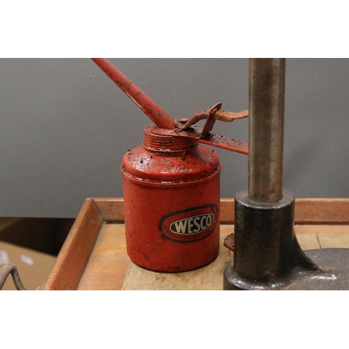 587 - A vintage pillar drill together with a Wesco oil dispenser.