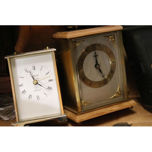 588 - A box of vintage wall clocks, mantle clocks and carriage clocks to include Metamec and schatz exampl... 