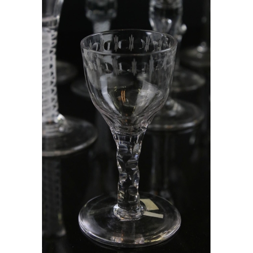 593 - A quantity of 18th and 19th wine and Cordial glasses some with air twist stem decoration single and ... 