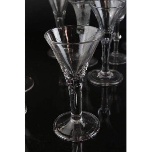 593 - A quantity of 18th and 19th wine and Cordial glasses some with air twist stem decoration single and ... 