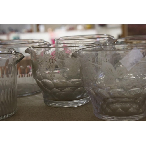 594 - A quantity of mainly 19th century glass rinses to include a set of six with etched grapevine decorat... 