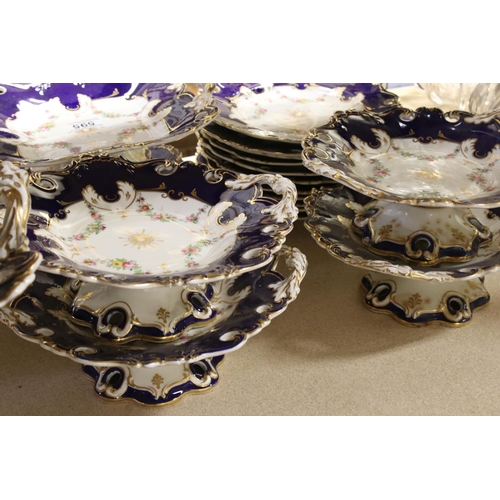 595 - A late 19th century blue and white ground part dinner service with floral swag decoration. Part of a... 