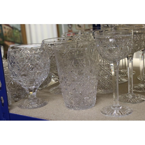 597 - A large quantity of good quality cut glass wine glasses,rummers jug etc.