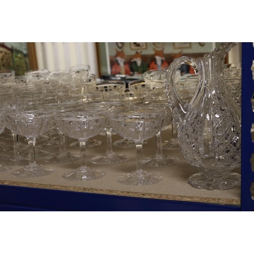 597 - A large quantity of good quality cut glass wine glasses,rummers jug etc.