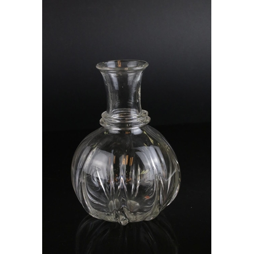 598 - A pair of antique baluster shaped glass decanters and three others without stoppers.