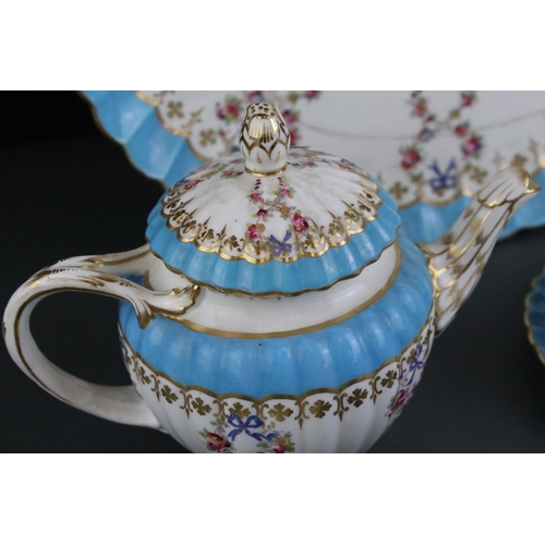 604 - An antique floral decorated bachelor's  tea set with turquoise banding and ribbed decoration.
Part o... 