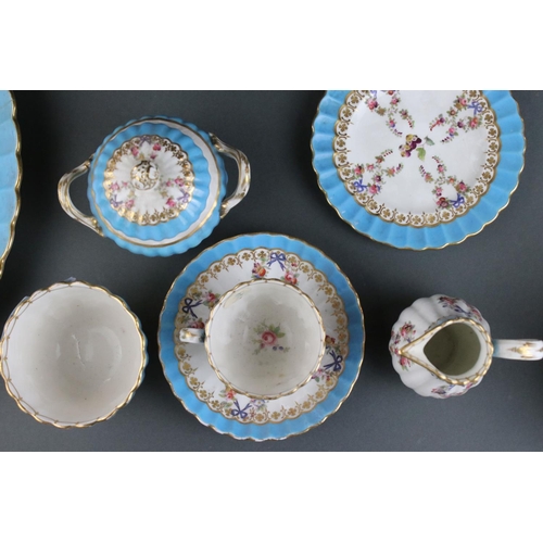 604 - An antique floral decorated bachelor's  tea set with turquoise banding and ribbed decoration.
Part o... 