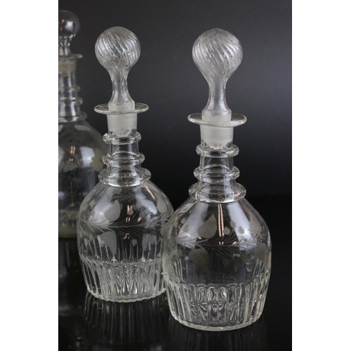 607 - A quantity of 19th century glass decanters some with etched and gilt decoration and a similar claret... 