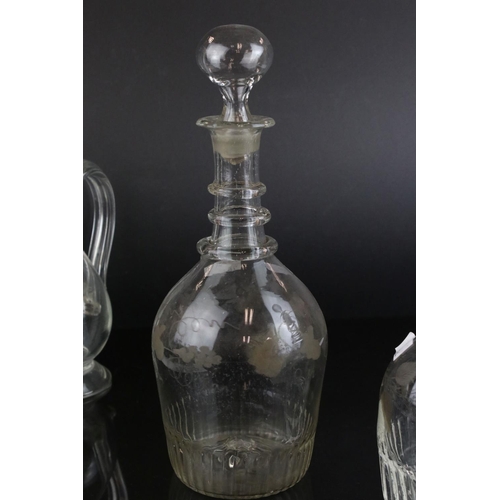 607 - A quantity of 19th century glass decanters some with etched and gilt decoration and a similar claret... 