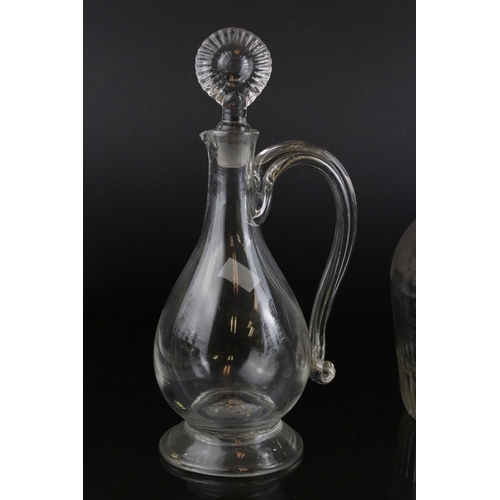 607 - A quantity of 19th century glass decanters some with etched and gilt decoration and a similar claret... 