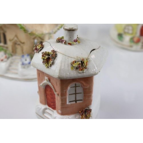 610 - 23 antique Staffordshire ceramic pastille burner houses of various designs. Part of an extensive col... 