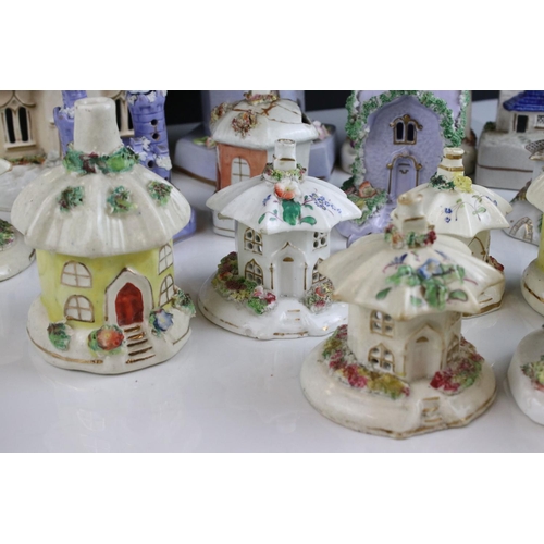 610 - 23 antique Staffordshire ceramic pastille burner houses of various designs. Part of an extensive col... 