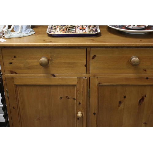 641 - Pine Dresser with three drawers over three cupboard doors, 151cms long x 192cms high