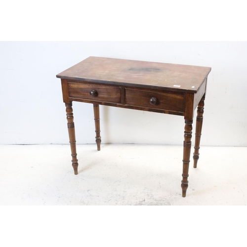 651 - 19th century Side Table with two drawers and raised on turned legs, 90cms wide x 77cms high