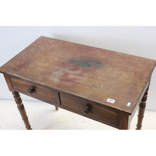 651 - 19th century Side Table with two drawers and raised on turned legs, 90cms wide x 77cms high