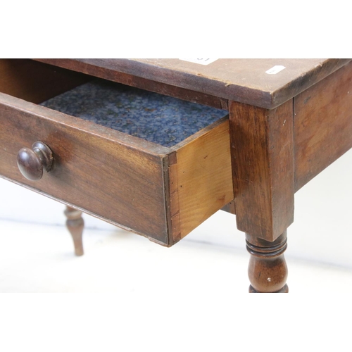 651 - 19th century Side Table with two drawers and raised on turned legs, 90cms wide x 77cms high