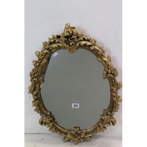 655 - 20th century Rococo style Gilt Oval Mirror, 67cms high