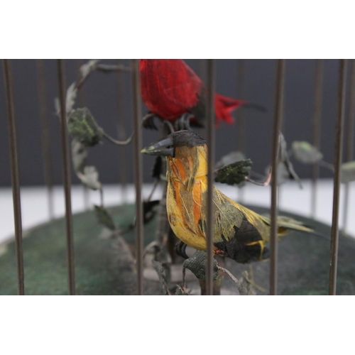 77 - A Singing Bird Automaton, Mid century, with two bird's sat within foliage, contained in a bronzed me... 