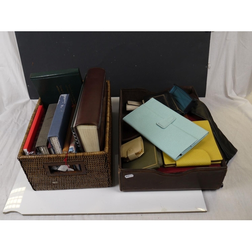 543 - A selection of notebooks, folios and purses together with a Seiko travel clock.