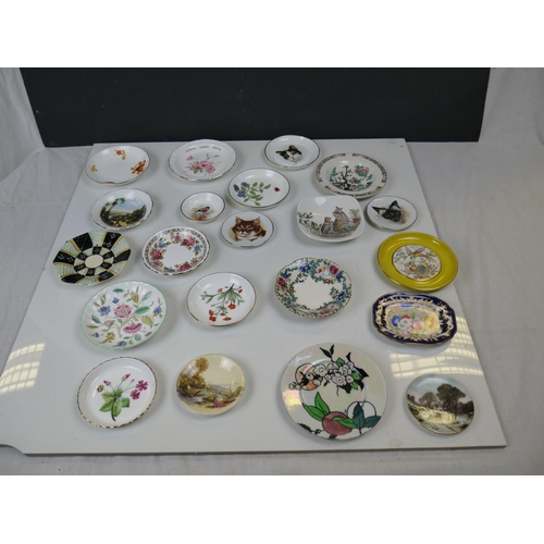 546 - A large collection of mixed miniature ceramics to include Wade Whimsies, motto ware and Spode dishes... 